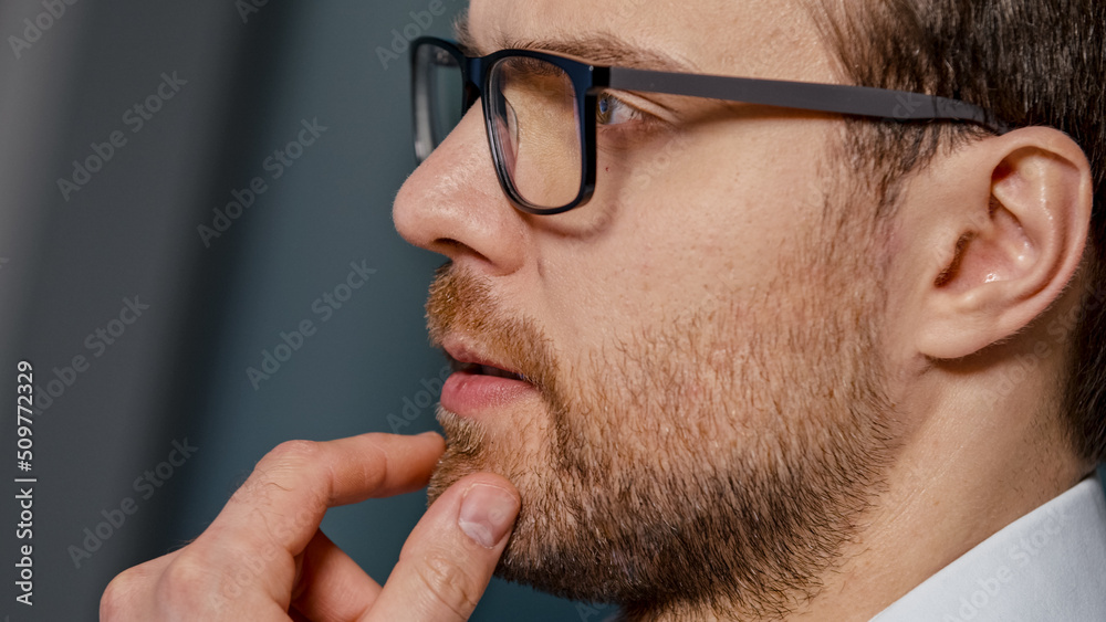Portrait of a young businessman thinking about a new project Portrait of a young businessman thinking about a new project