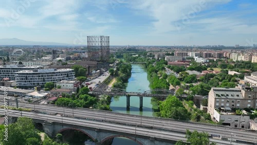 Il Gasometro o Gazometro del quartiere Ostiense di Roma, Italia.
Vista aerea della vecchia struttura in ferro simbolo del quartiere Ostiense. photo