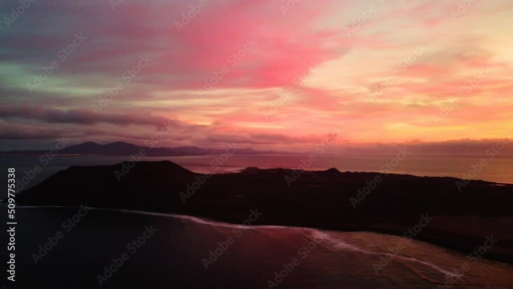 custom made wallpaper toronto digitalDramatic aerial panning view of a magical magenta sunrise over Lobos island near Corralejo in Fuerteventura 