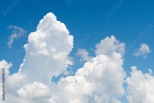 Nimbostratus clouds gather on a blue sky