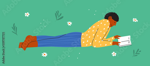 Book club art vector illustration. Male character reads outdoors. Man relaxing in nature park with book in hand. Guy lying down on flower lawn reading poetry, literature. Summer leisure activity, rest photo