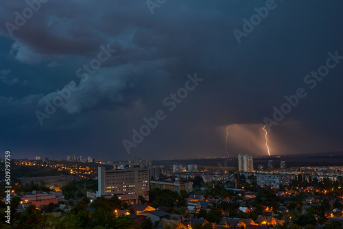 Lightning strikes at the city at night