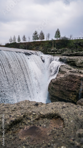 Niagara Falls near the capital Podgorica in Montenegro. Montenegrin landmark. Niagara Falls on the Tsievna River, which flows from the Prokletie National Park to the Skadar Lake. Water beats on stone