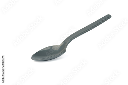 one plastic spoon isolated on white background.
