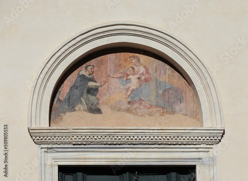 Santa Maria Sopra Minerva Basilica Facade Painted Detail Above an Entrance in Rome, Italy photo