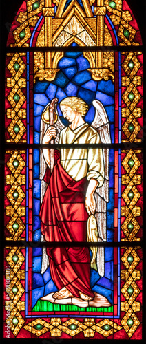 VALENCIA, SPAIN - FEBRUAR 16, 2022: The archangel Raphael on the stained glas...