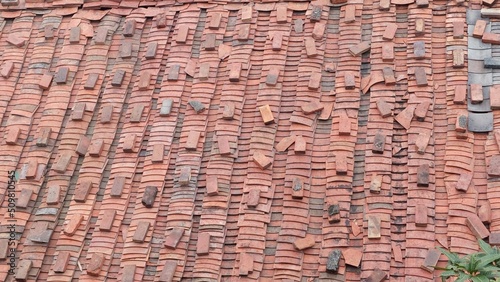red bricks background of traditional vintage bricks roof