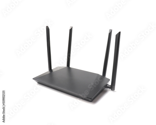 Wireless router. wireless wi-fi black router with four antennas isolated on white background. High speed internet connection.