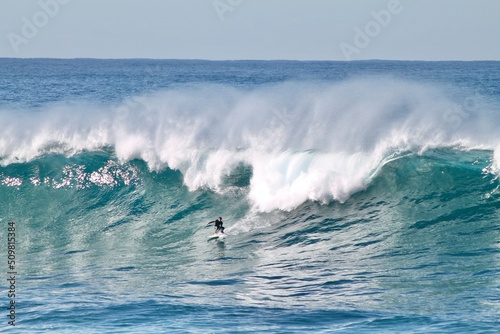 Surfer on a Huge Australian Wave. This is tow-in surf with Jet ski. the exact place is Coogee.