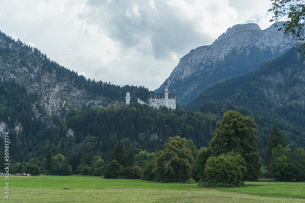 Castle in the mountains, Bavaria Alps with castle, Beautiful view in Alps in summer, neuschwanstein castle view, View in Bavaria Alps, Famouse white Castle in Germany, Fairytale Building