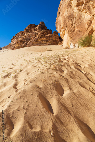 Sand dune in Sinai desert among the rocks and blue sky in Sinai Peninsula, Egypt