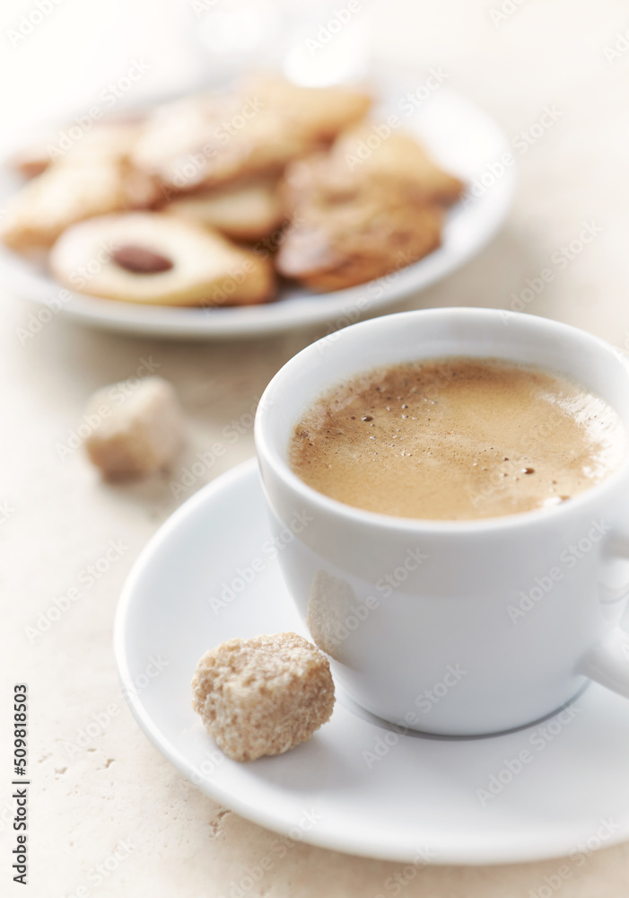 Cup of Coffee on bright stone background. Close up. Cup of Coffee on bright stone background. Close up.