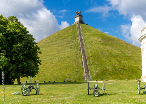 view of the Lion's Mound and cannons at the Waterloo Battlefield Memorial outisde of Brussels