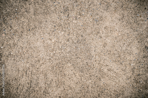 op view of old and brown floor with rough concrete. coarse material, granular limestone Grunge texture for background.