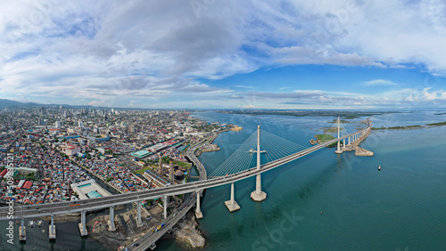 Cebu City, Philippines - Panoramic aerial of the Metro Cebu Skyline and Cebu - Cordova Bridge.