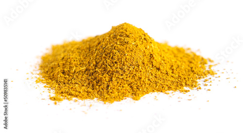 Pile of curry powder isolated on white background. Spices and herbs. Close-up, top view.