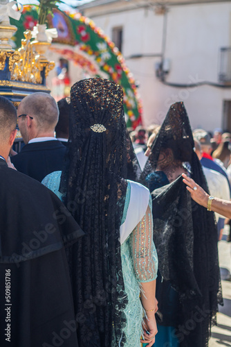 Santera carrying the virgin of the castle in Bernardos photo