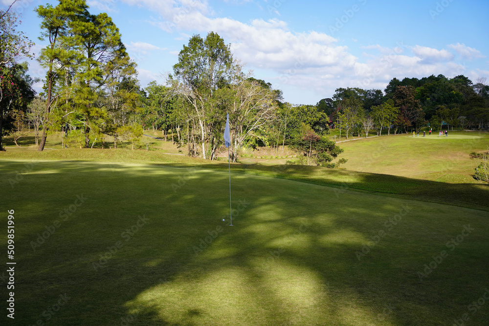 View of Golf Course with beautiful putting green. Golf course with a rich green turf beautiful scenery. View of Golf Course with beautiful putting green. Golf course with a rich green turf beautiful scenery.