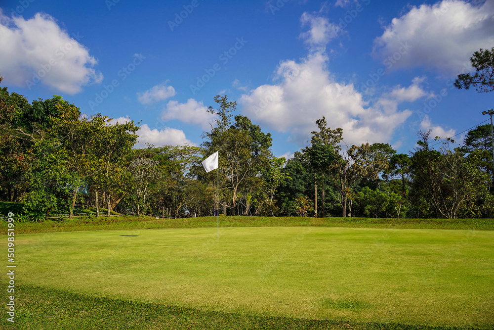 View of Golf Course with beautiful putting green. Golf course with a rich green turf beautiful scenery. View of Golf Course with beautiful putting green. Golf course with a rich green turf beautiful scenery.