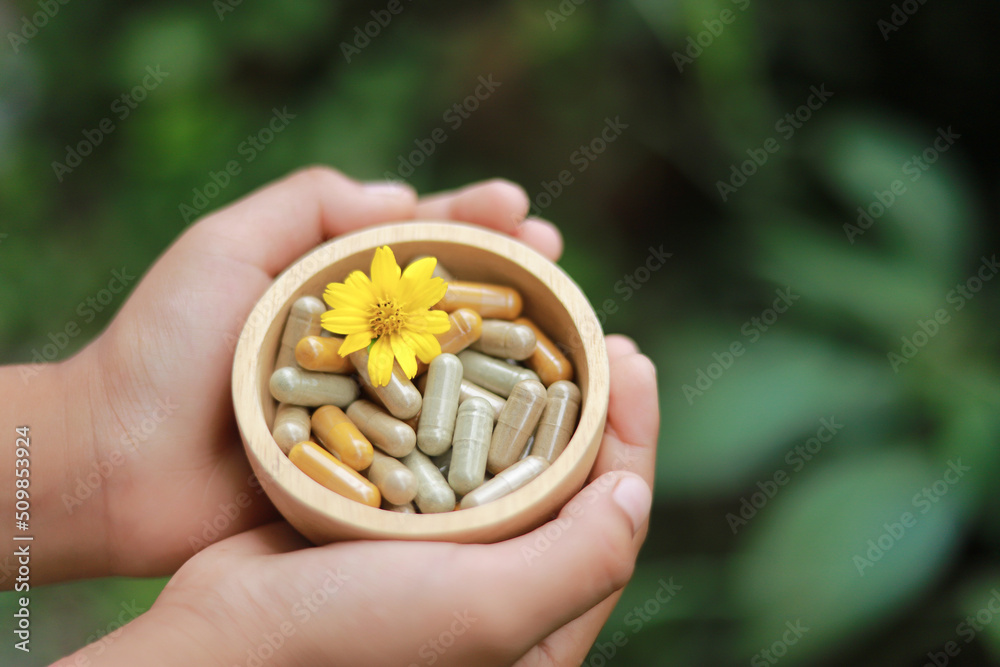 hand hold herbal medicine in bowl for healthy eating hand hold herbal medicine in bowl for healthy eating
