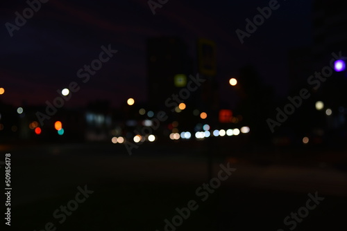 Defocused night traffic multicolored lights evening city Chelyabinsk strange background