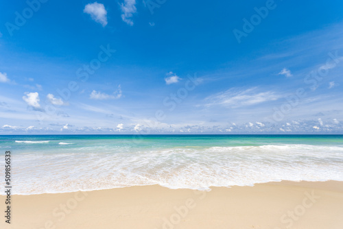 Travel vacation background concept at summer beach with the sunny sky at Phuket island, Thailand. Beautiful scene of blue sky and clouds on a sunny day. Empty holiday sea where horizon can see clearly © Nos