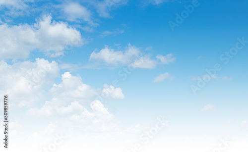 Fototapeta Naklejka Na Ścianę i Meble -  Blue and white sky background gradient, beautiful fluffy clouds on cyan heaven backdrop in afternoon in spring season . Light cloud in a good weather day. Natural lanscape environment in the air