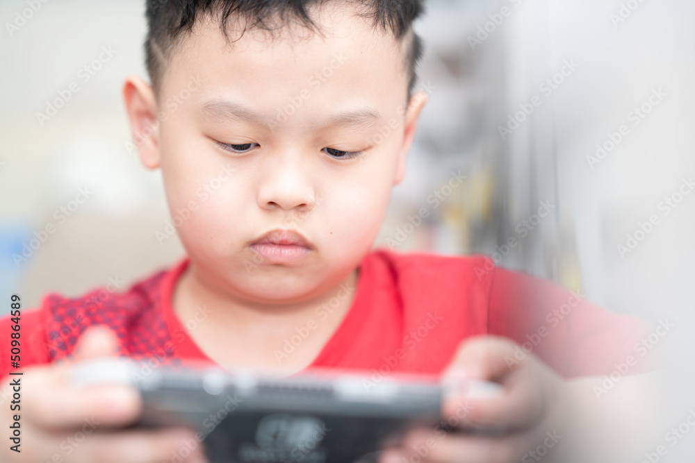 child plays game console for fun child plays game console for fun