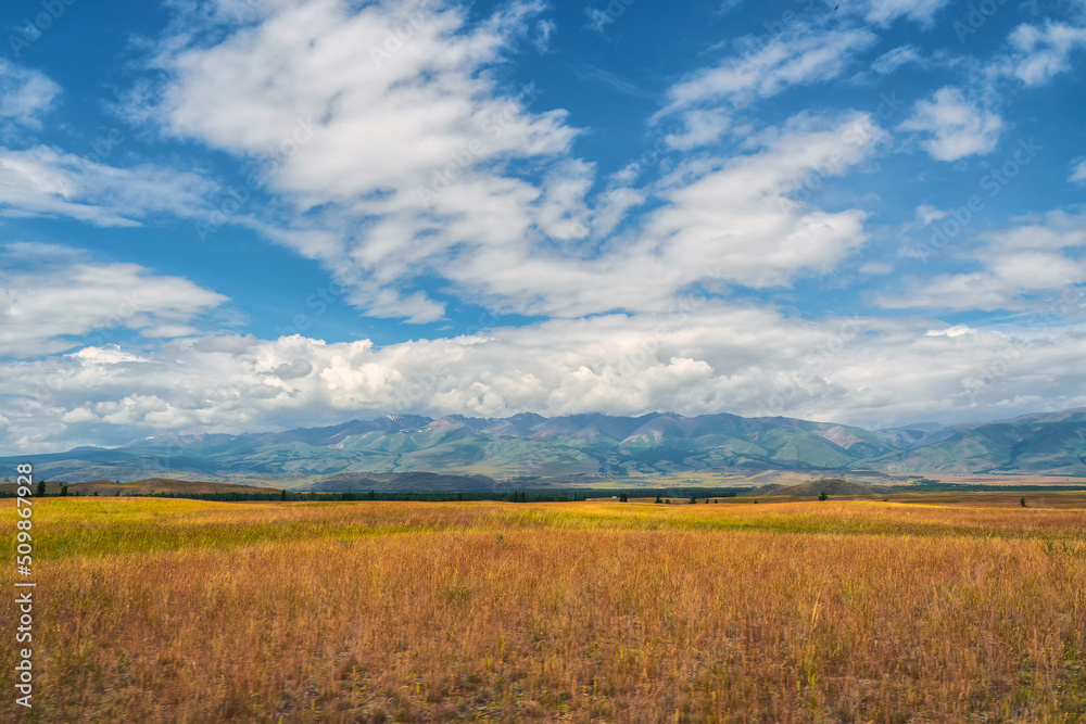 Background of agricultural field and mountains. Sky with mountains in the background.