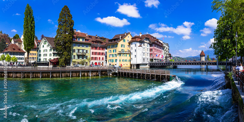 Charming romantic town Luzern, popular tourist attraction in Switzerland. old town with canals and famous wooden bridges