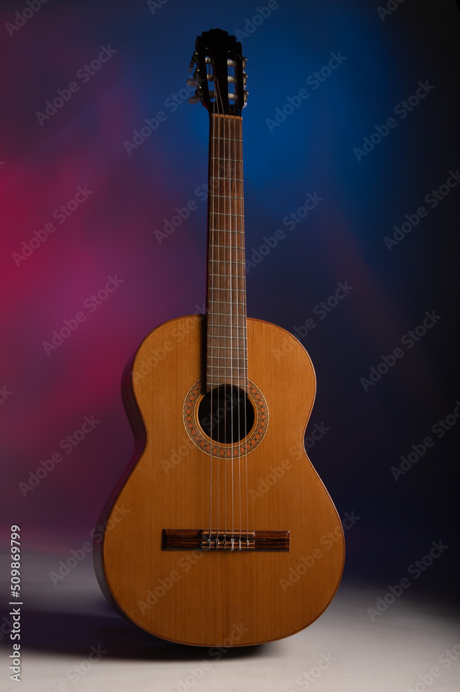 Classical guitar on a colourful background