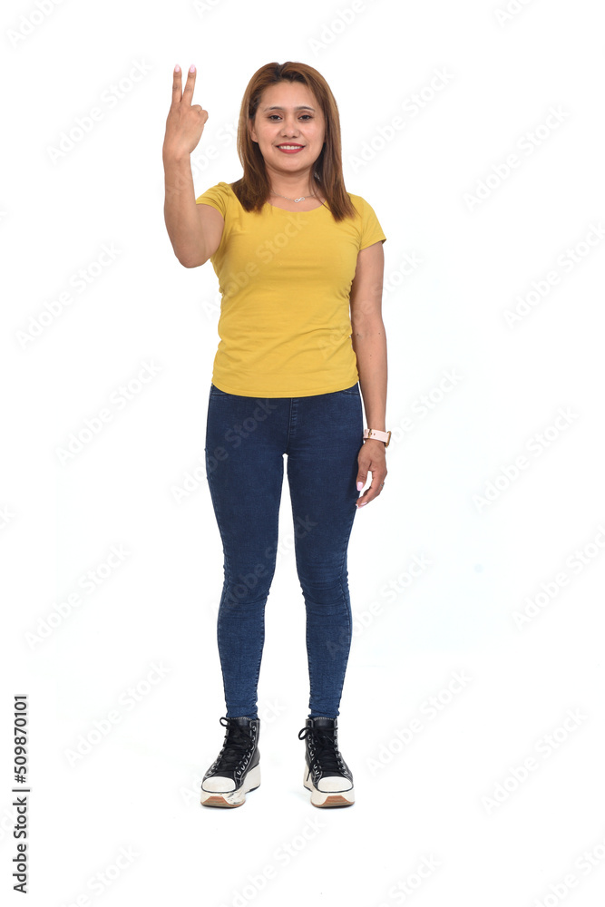 full portrait of a woman with two finger raising on white background full portrait of a woman with two finger raising on white background