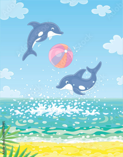 Merry little dolphins in splashes jumping out of water and playing with a big colorful ball near a sandy beach of a palm island in a tropical sea, vector cartoon illustration