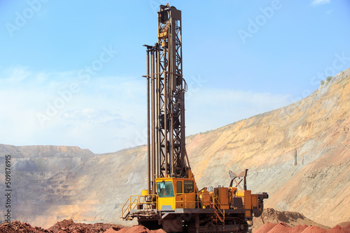 Machine for drilling wells in the quarry. Drilling of boreholes for laying an explosion in a quarry. Technologies of open-pit mining of minerals.