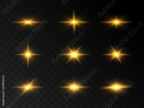 Glow of golden sparks of light on a transparent background. Blurred vector collection of stars. Explosive flash, sun, flare and bright cloud.