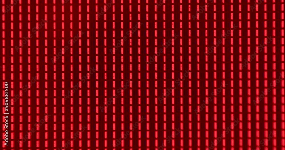 Flashing red and black in LCD screen pixels. Video transition in the change of calves. Rectangular bulbs create even rows. Flashing red and black in LCD screen pixels. Video transition in the change of calves. Rectangular bulbs create even rows.