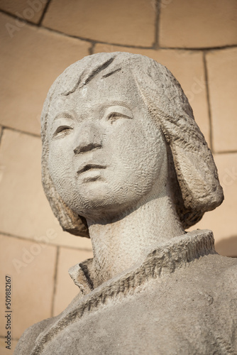 Wallpaper Mural Sculpture stone child head. Long hair.
 Torontodigital.ca