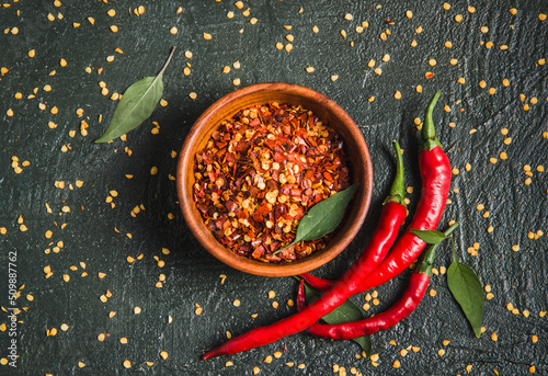 Canvastavla Dry chili pepper flakes and fresh chili peppers