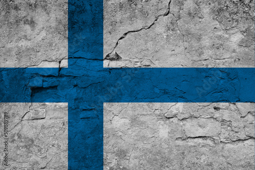 Patriotic cracked wall background in colors of national flag. Finland