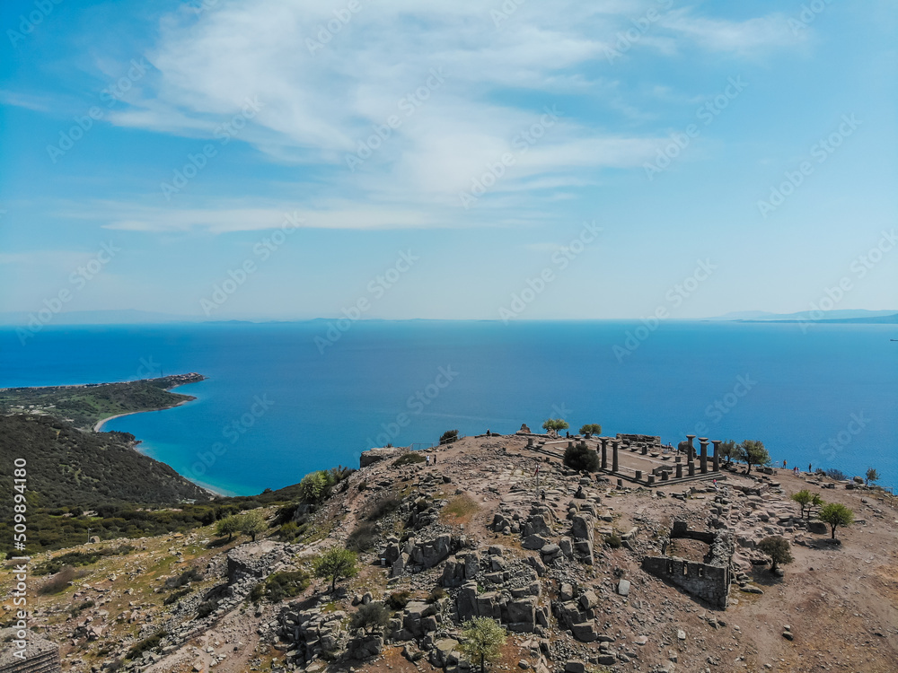 Athena temple, Assos. Aerial view of the ruins in the ancient city of Asos. Behramkale, Canakkale, Turkey Athena temple, Assos. Aerial view of the ruins in the ancient city of Asos. Behramkale, Canakkale, Turkey