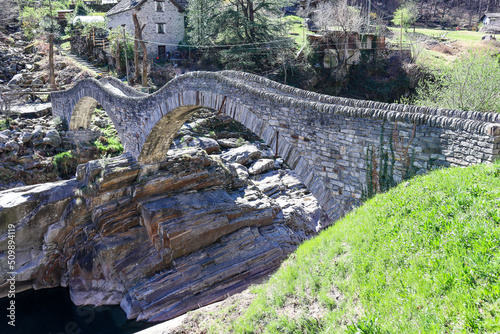 Historic Romain Bridge, over the Verzasca River, in Lavertezzo