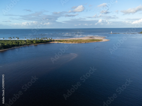 Sandbar separating river and sea in the midst of nature - Itacaré, Bahia, Brazil