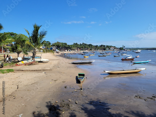 Fototapeta Naklejka Na Ścianę i Meble -  Beautiful fishing village with a river beach full of fishing boats - Praia da Caroa, Itacaré, Bahia, Brazil