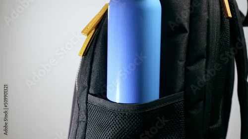 Backpack and waterbottle photo