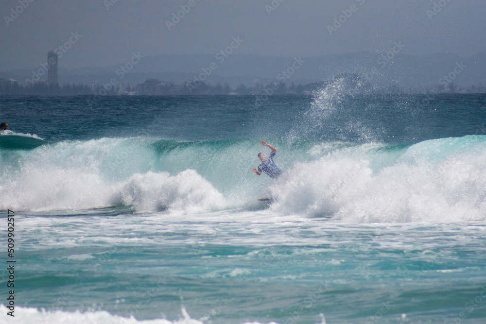 Surfer Emerging from Crashing Wave
