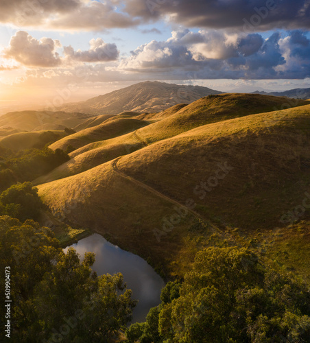 Golden rolling hills in summer, San Jose, California photo