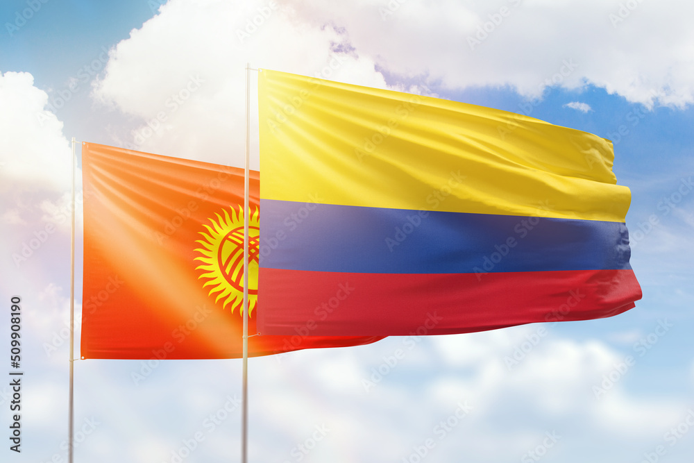 Sunny blue sky and flags of colombia and kyrgyzstan Sunny blue sky and flags of colombia and kyrgyzstan