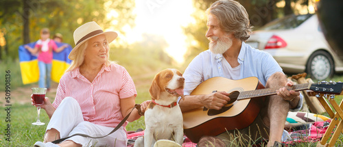 Happy senior couple with do...