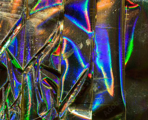 Silver holographic foil detail shot photo