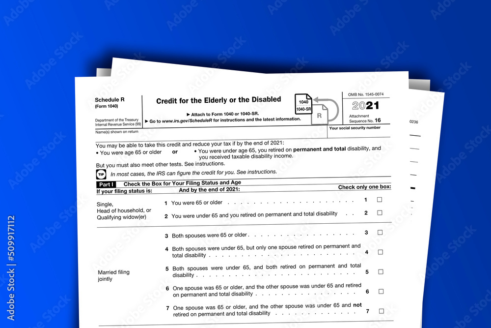 Fototapeta premium Form 1040 (Schedule R) documentation published IRS USA 10.25.2021. American tax document on colored